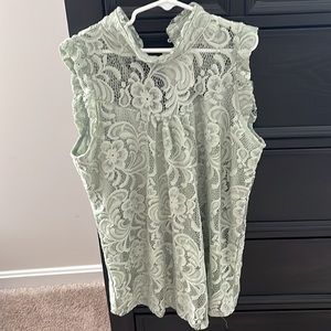 Sleeveless Blouse with floral pattern